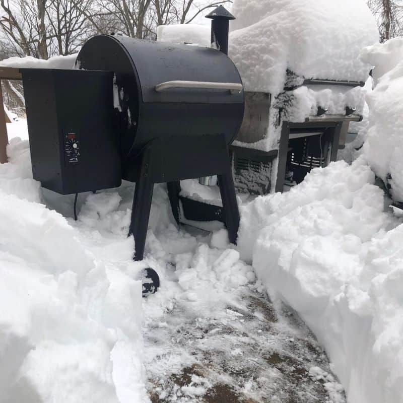 Traeger pellet grill outside in 16 inches of snow